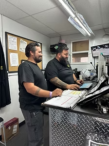 OTC service team scheduling fleet work at the service desk